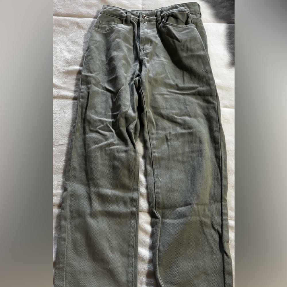 green denim jeans